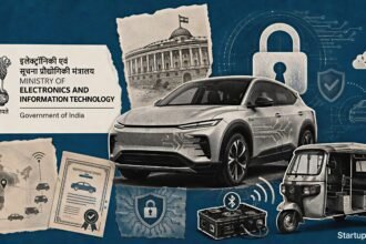 ndia auto cybersecurity rules visual with a connected vehicle, digital lock, MeitY emblem and vulnerable e-rickshaw battery system