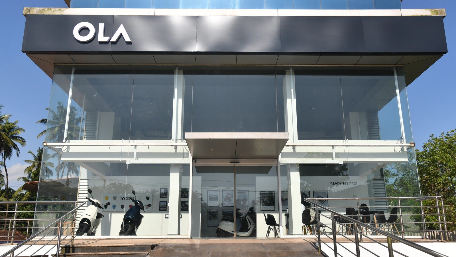 Ola Electric Rights Issue: Rs 1,000 Cr Meeting Deferred 41 Ola Electric rights issue deferred, an Ola S1 electric scooter at a showroom